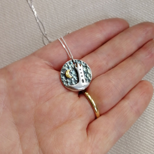 Scrabo Tower with gold crescent moon