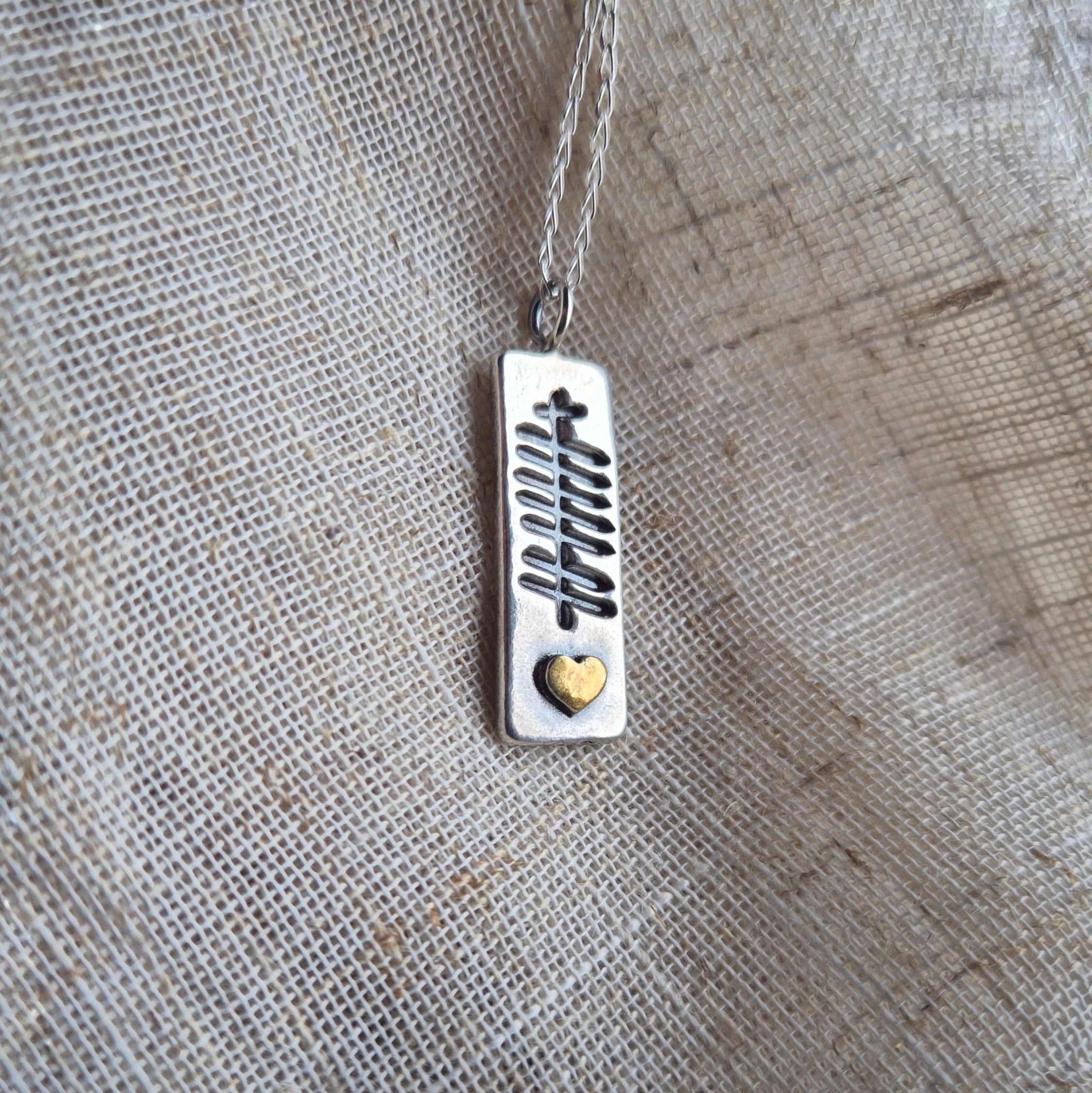 Grá (love) with gold heart - ogham pendant