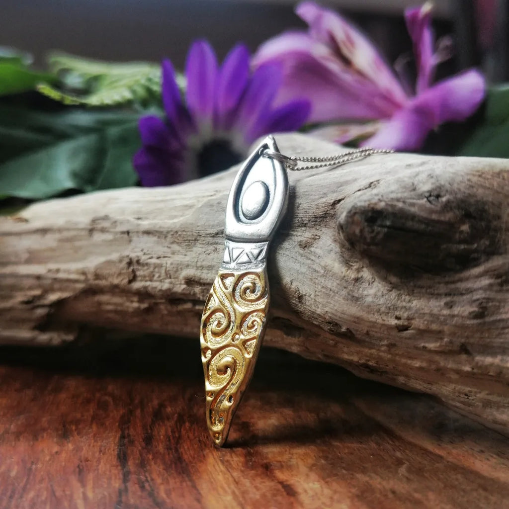 Selkie gold and silver pendant