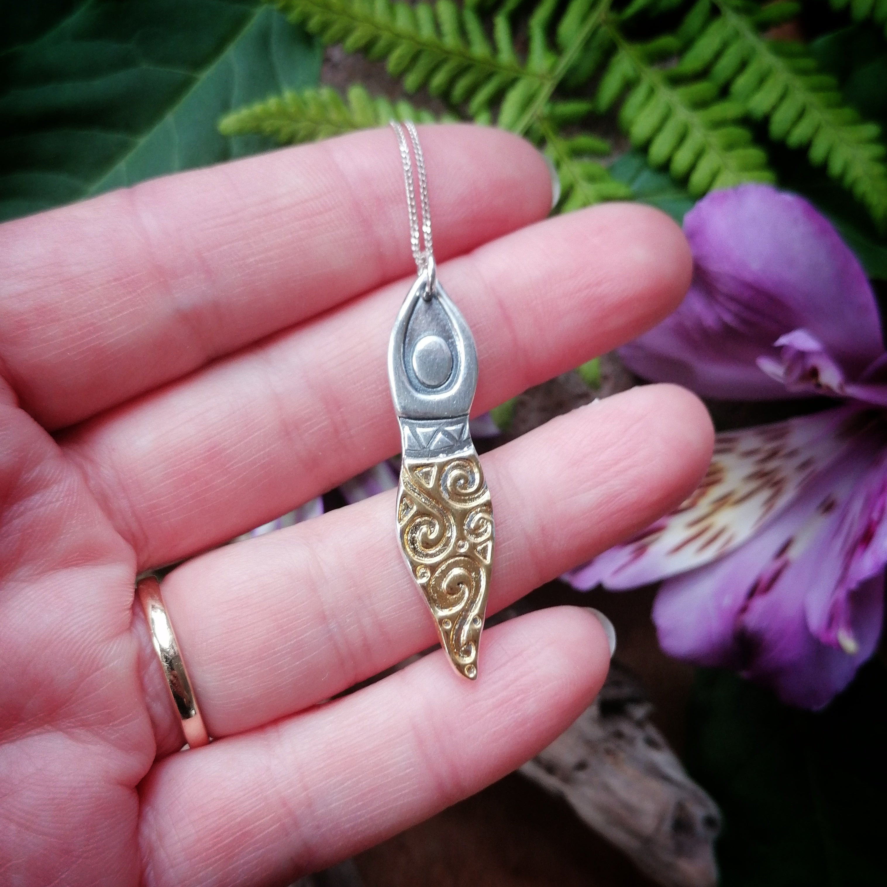 Selkie gold and silver pendant