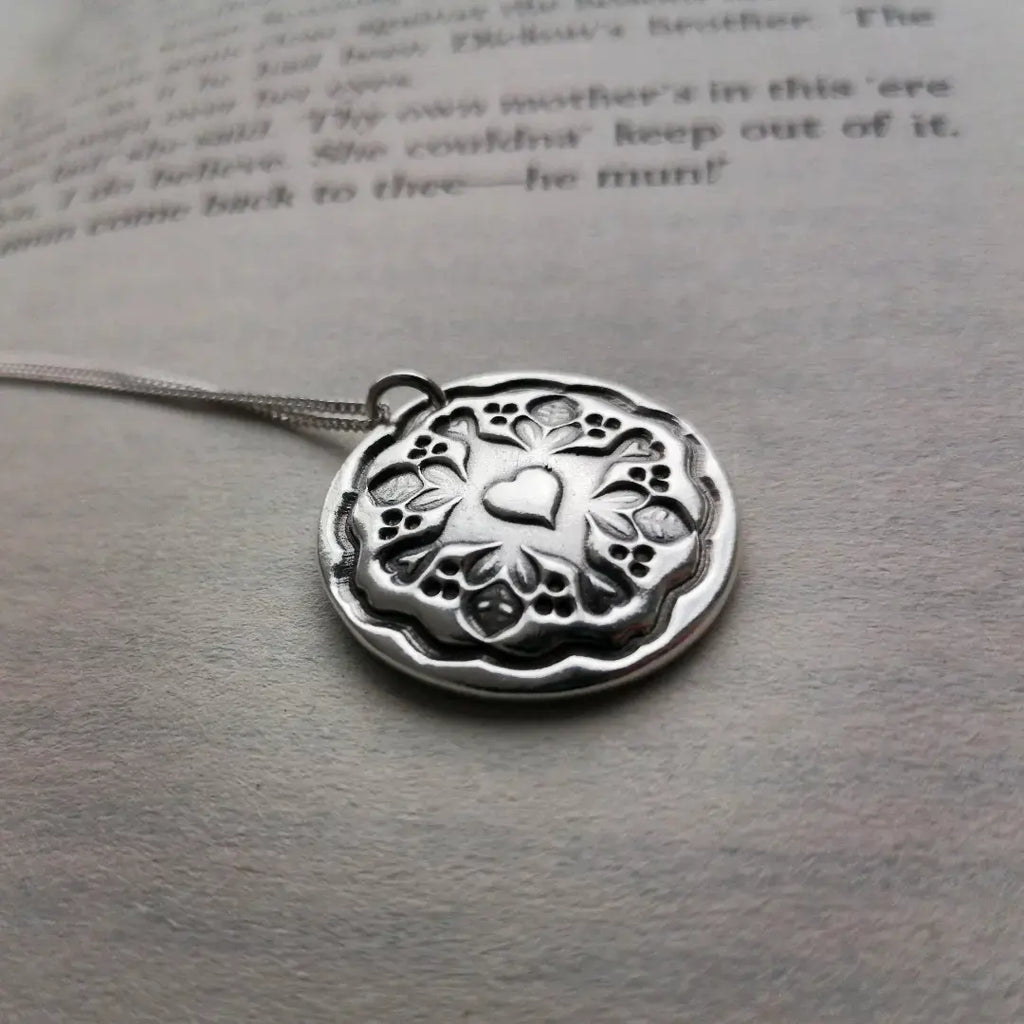 Antique button pendant