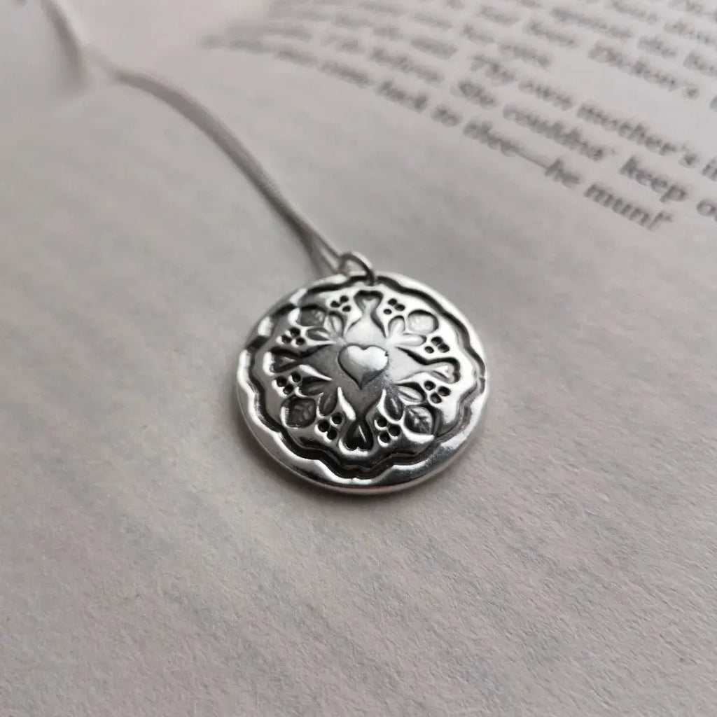 Antique button pendant